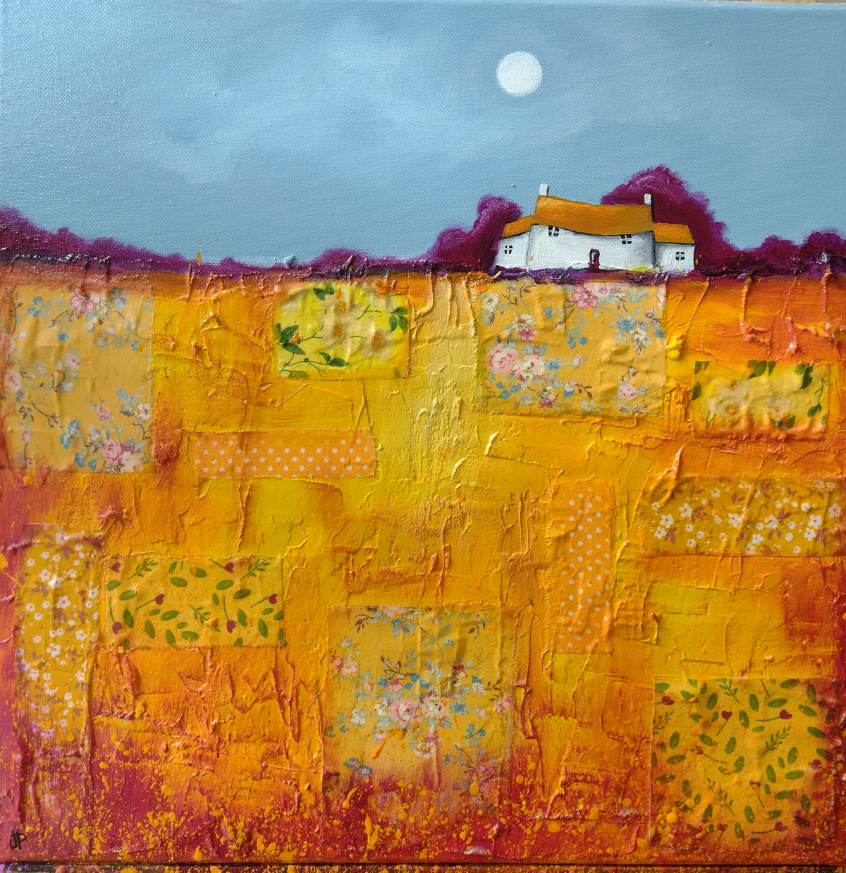 Houses on golden yellow fields