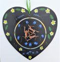 Hares with primroses on a heart