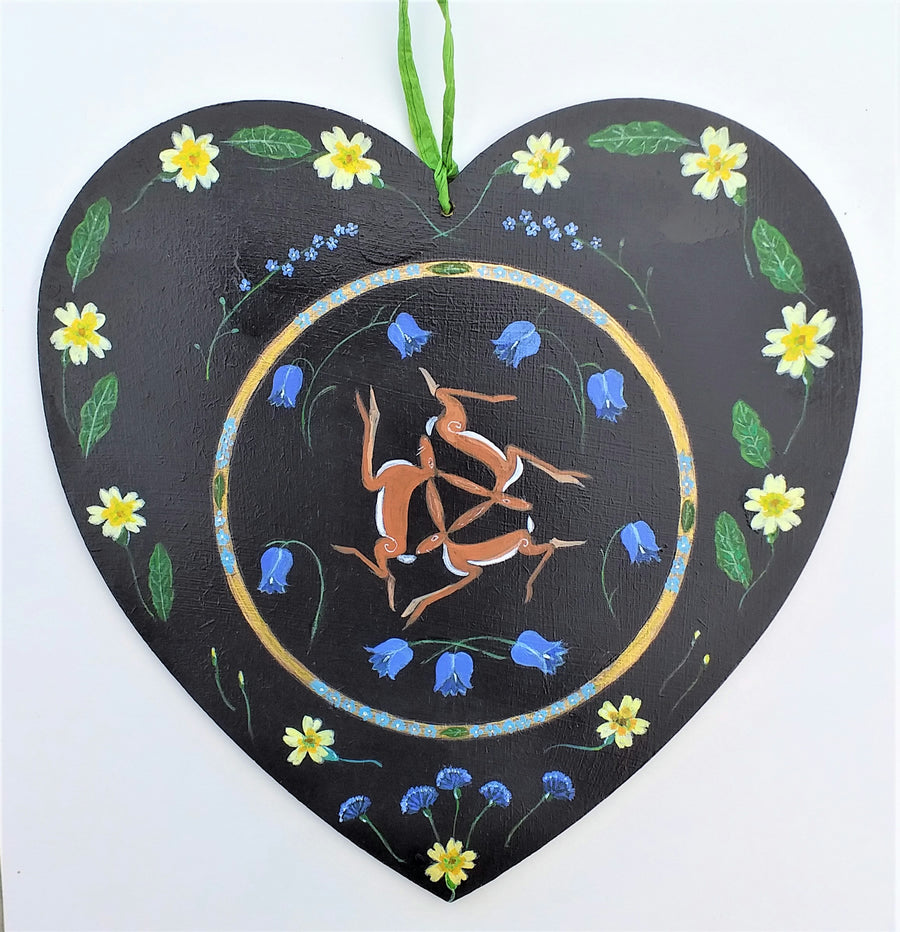 Hares with primroses on a heart