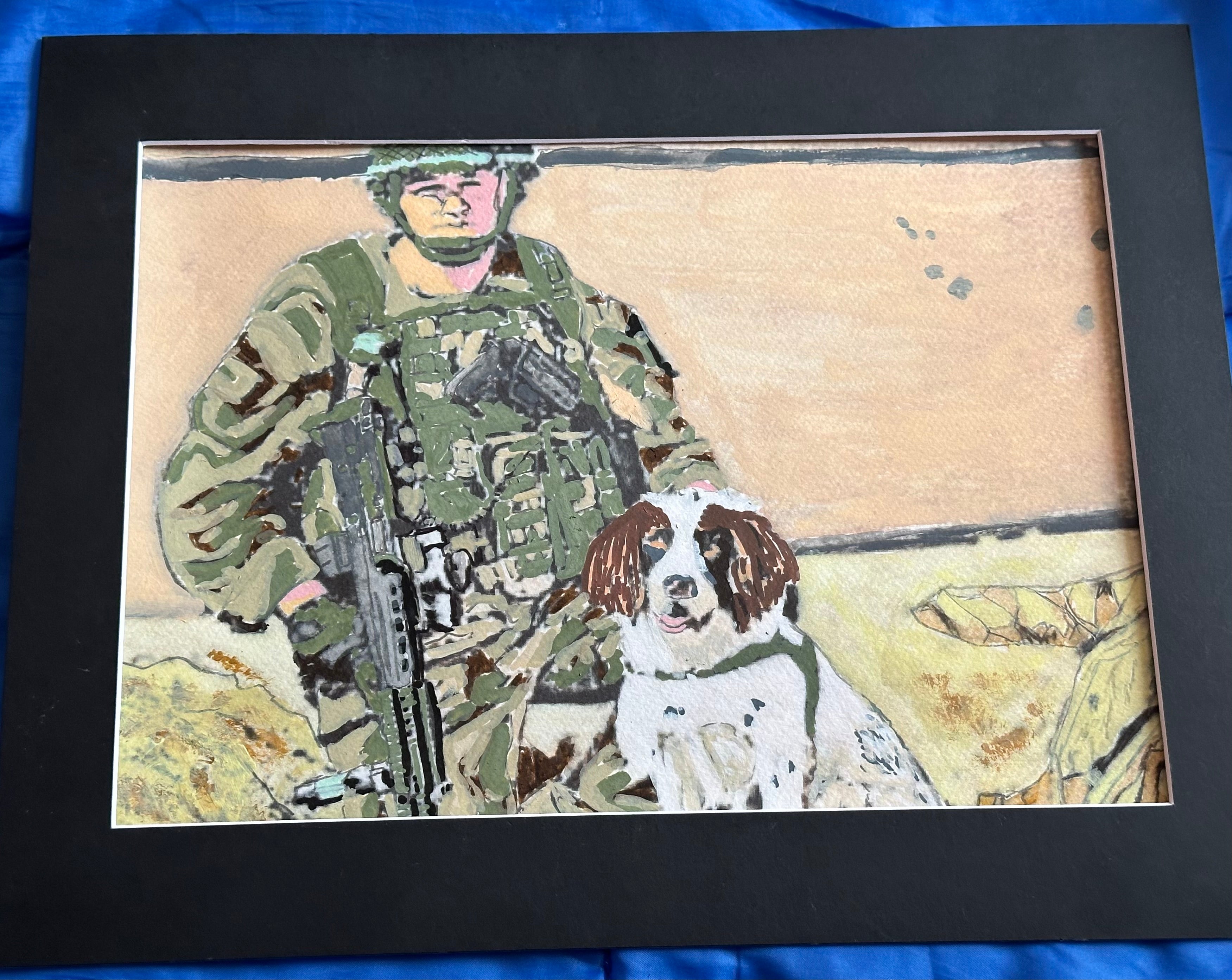 Military dog handler with snifffer cocka spaniel called Jess