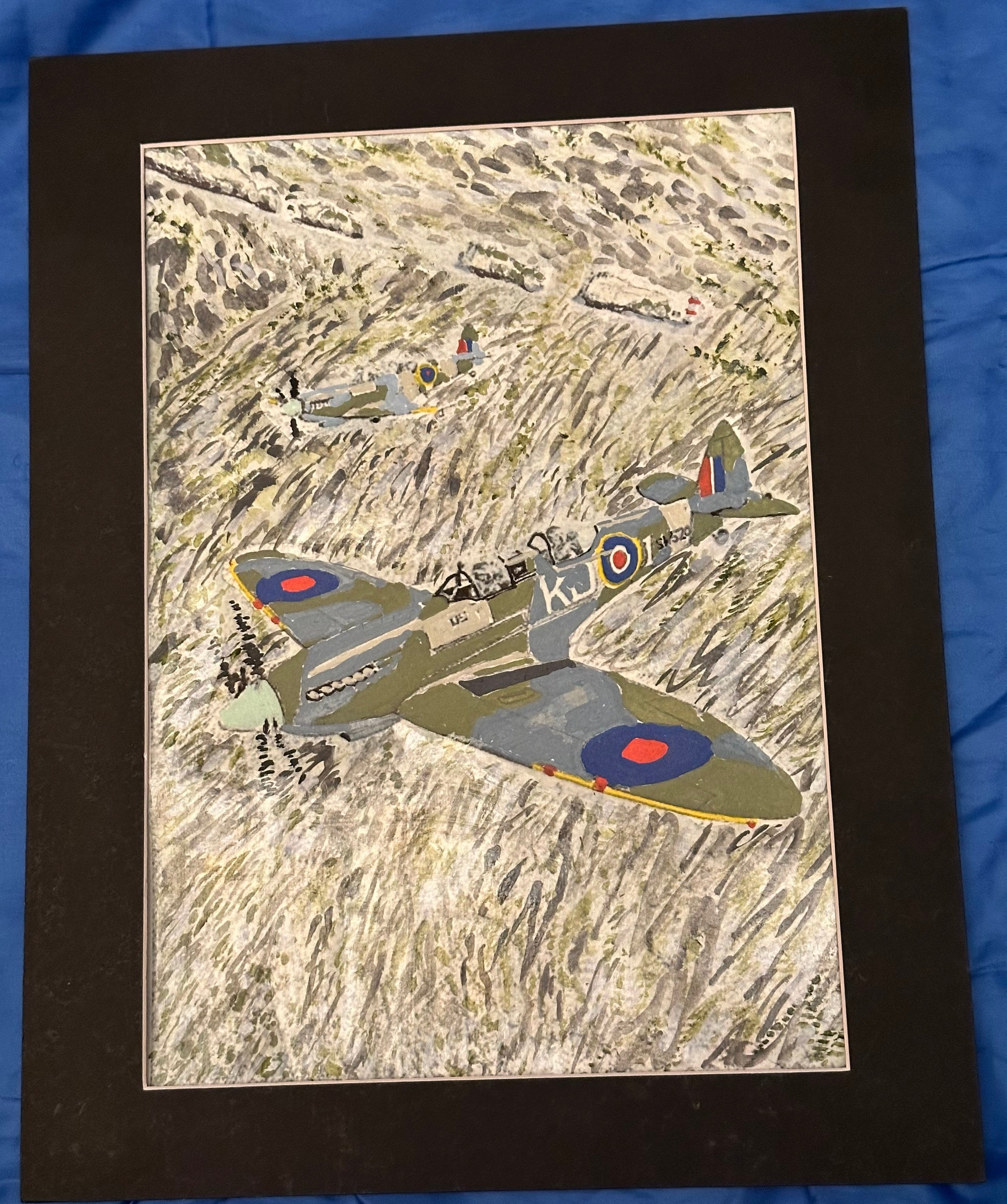 A Second World War plane spitfire flying over the needles   English Channel