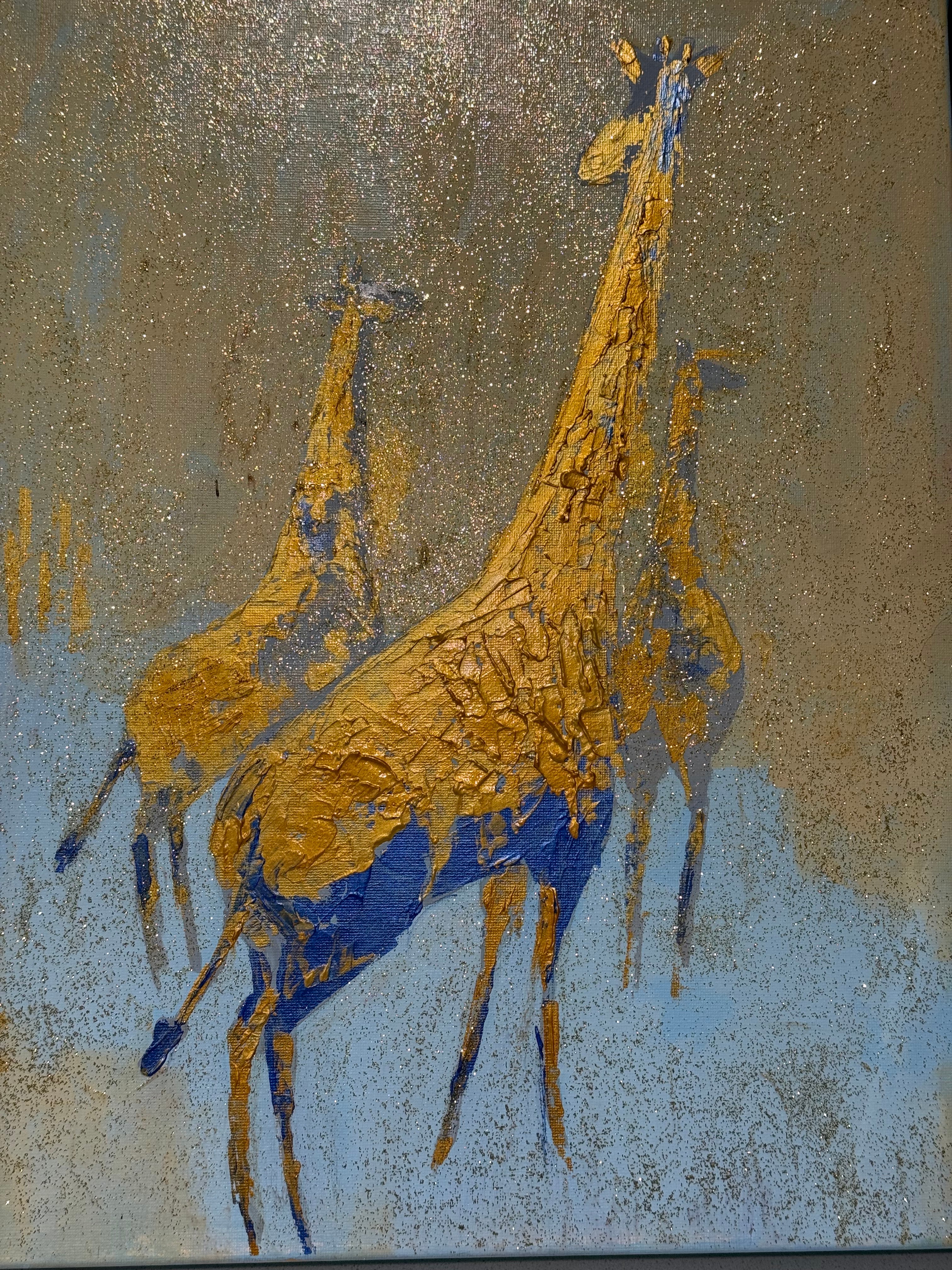Golden giraffes with head in the sky