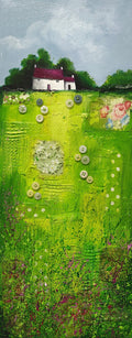 House on green patchwork field