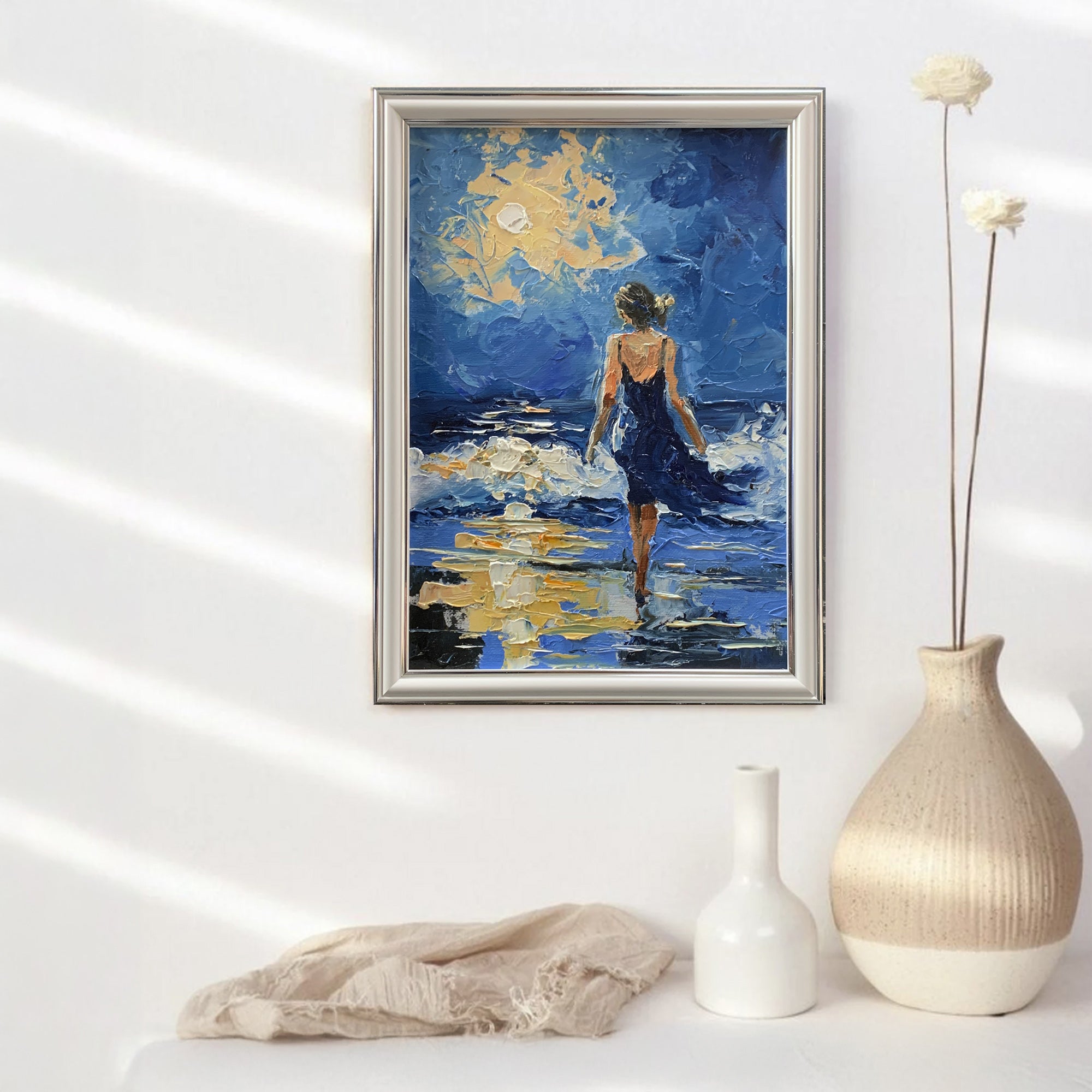 Moon night by the sea. Woman figure