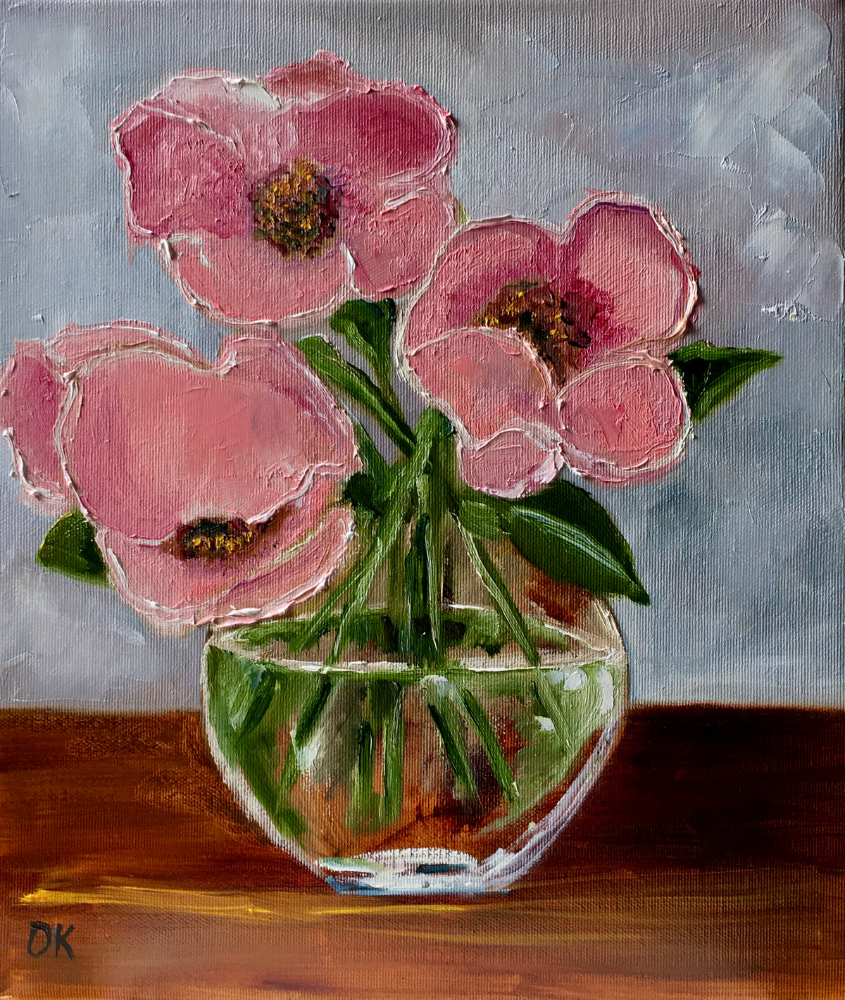 Coral roses in a vase.