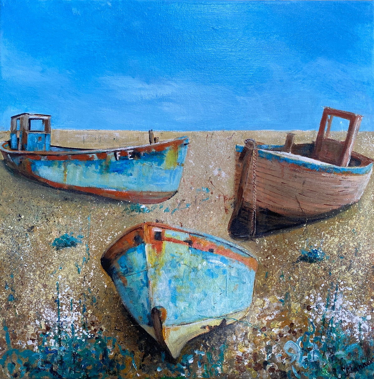 Three boats on the beach