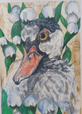 A duck in lilies of the valley